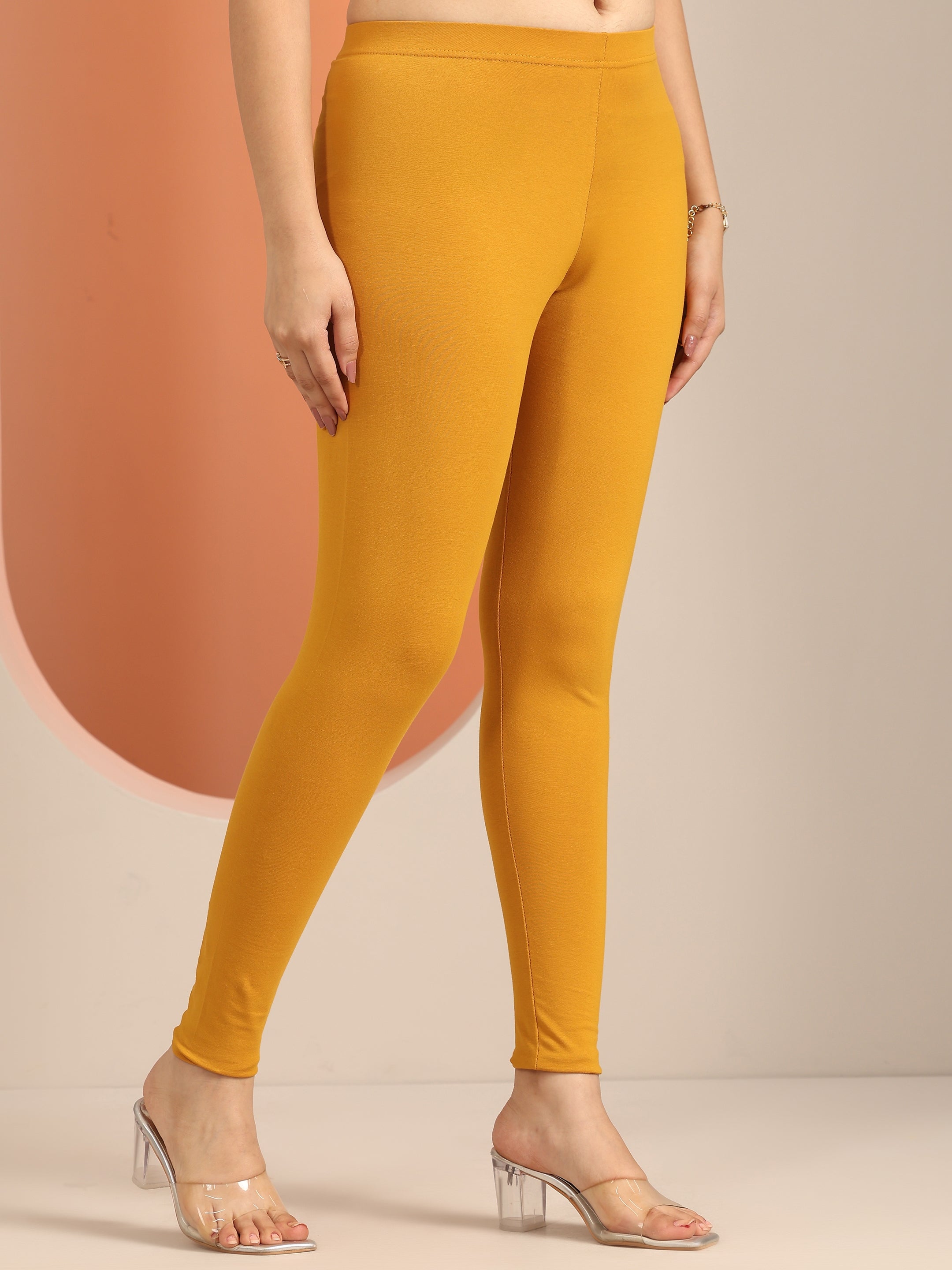 Buy Mustard Solid Cotton Blend Leggings Online in USA at $14.00