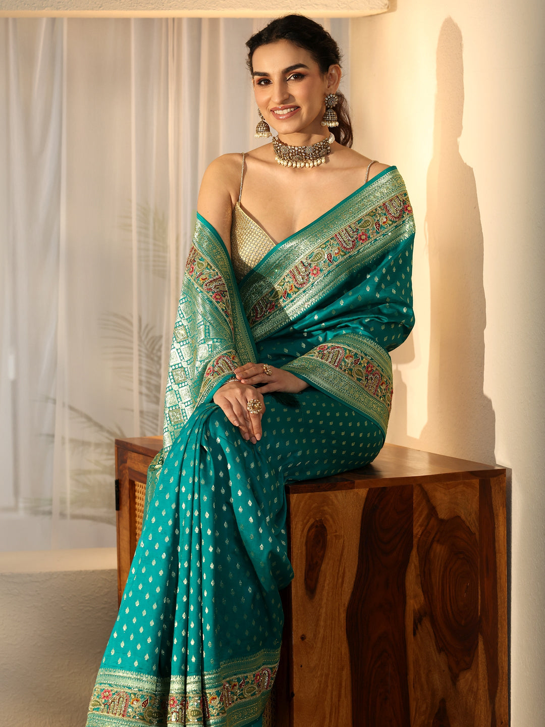 Libas Art Teal Green Silk Blend Saree with Woven Border