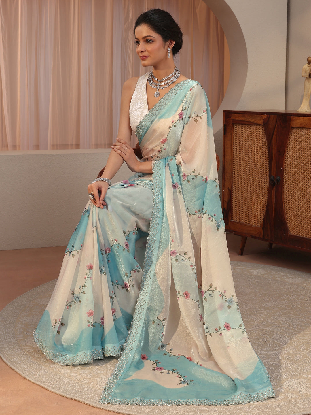 Baby Blue And Ivory Embellished Tissue Saree