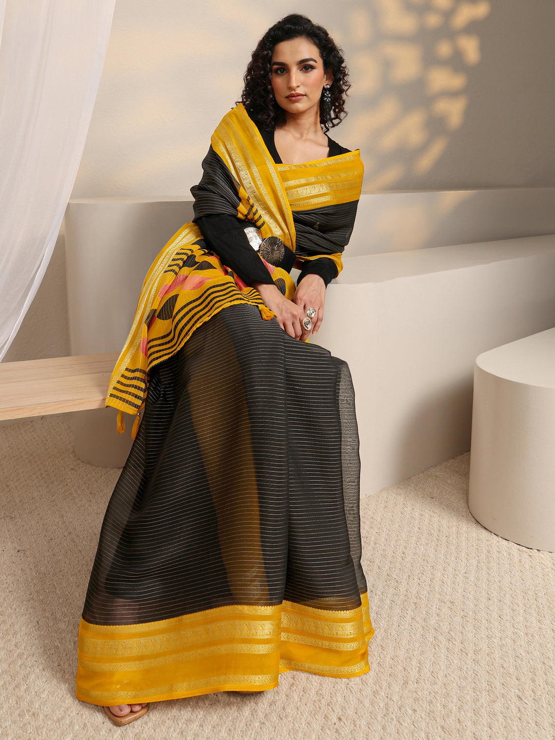 Black Printed Silk Blend Saree 
With Unstitched Blouse Piece