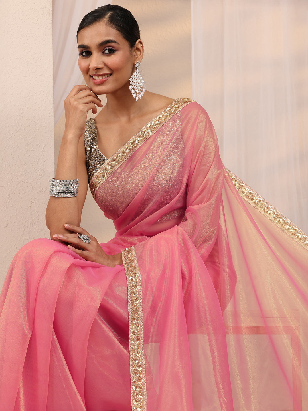Coral Embellished Sheen Net Saree 
With Unstitched Blouse Piece