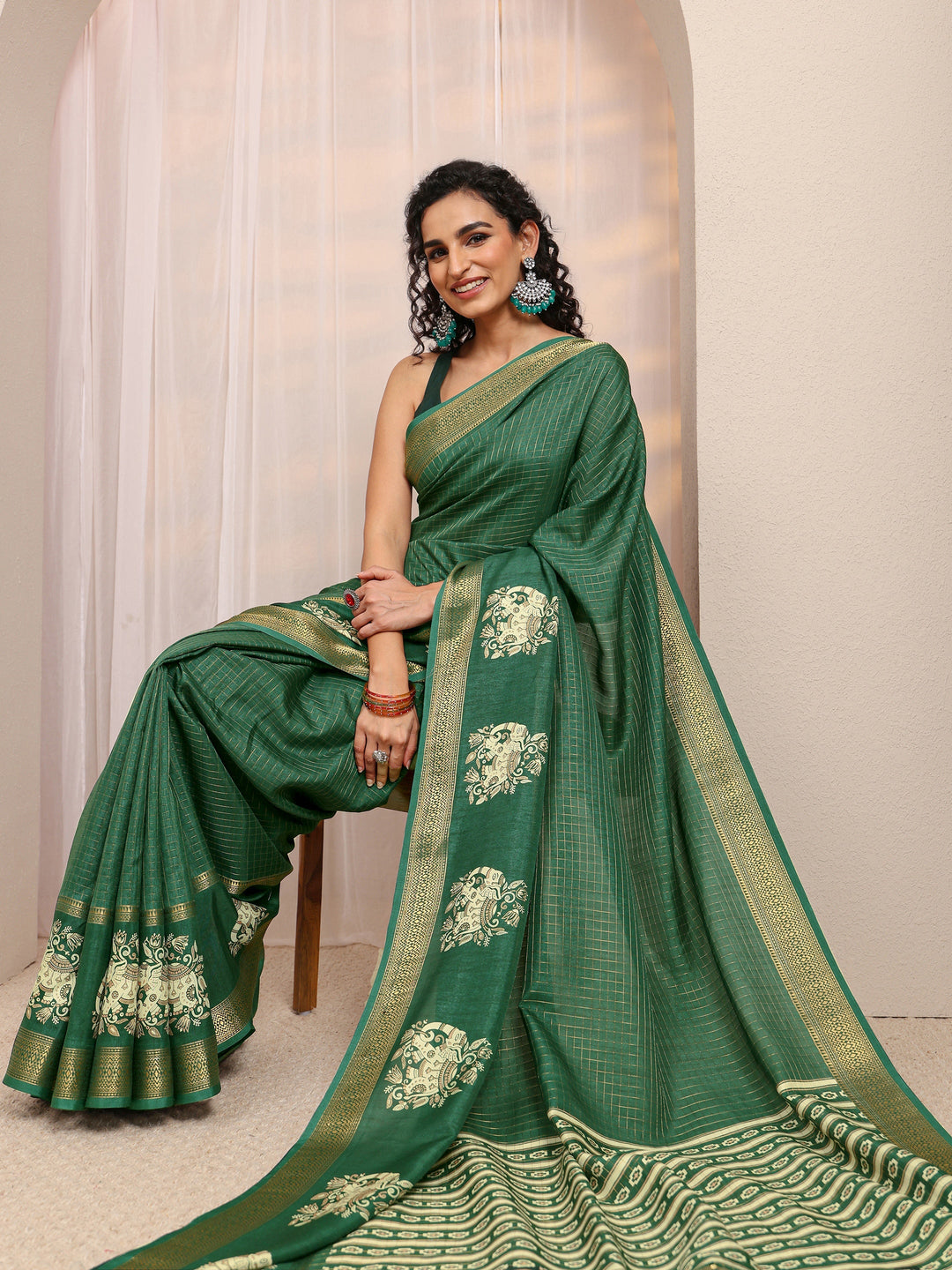 Green Ethnic Motif Woven Design Silk Blend Saree 
With Unstitched Blouse Piece