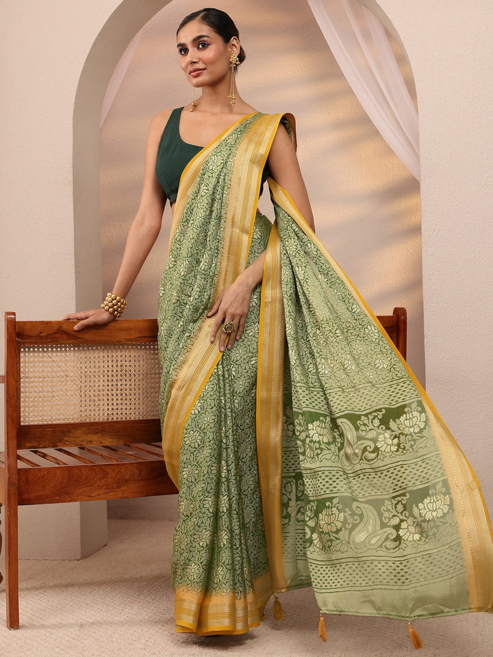 Green Woven Design Silk Blend Saree 
With Unstitched Blouse Piece