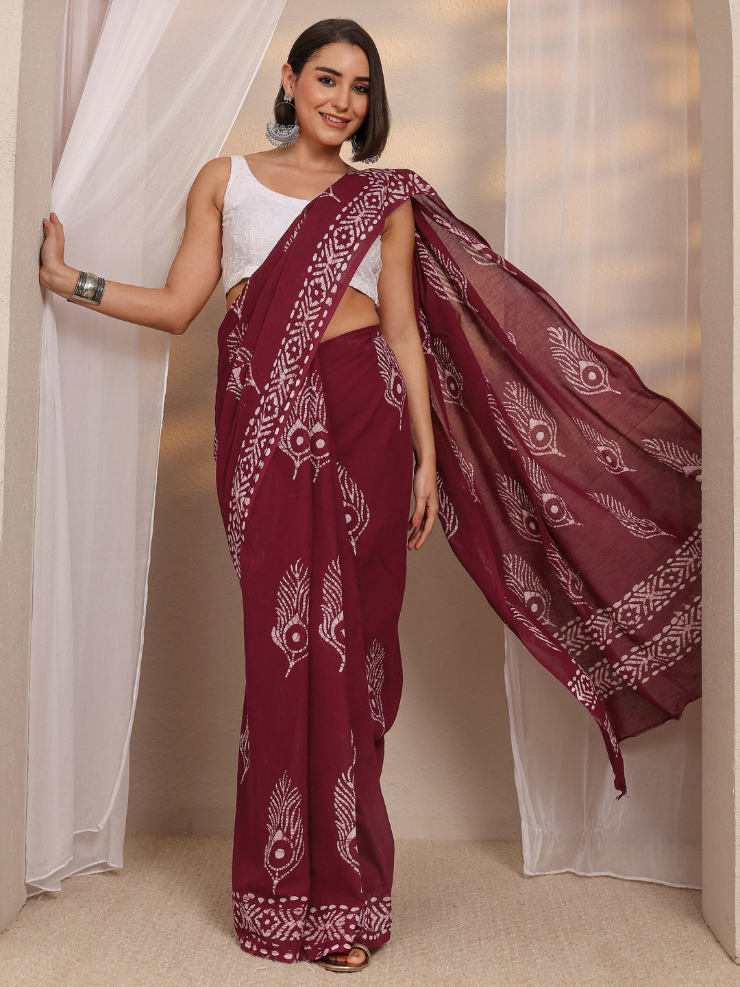 Maroon Printed Cotton Saree 
With Unstitched Blouse Piece