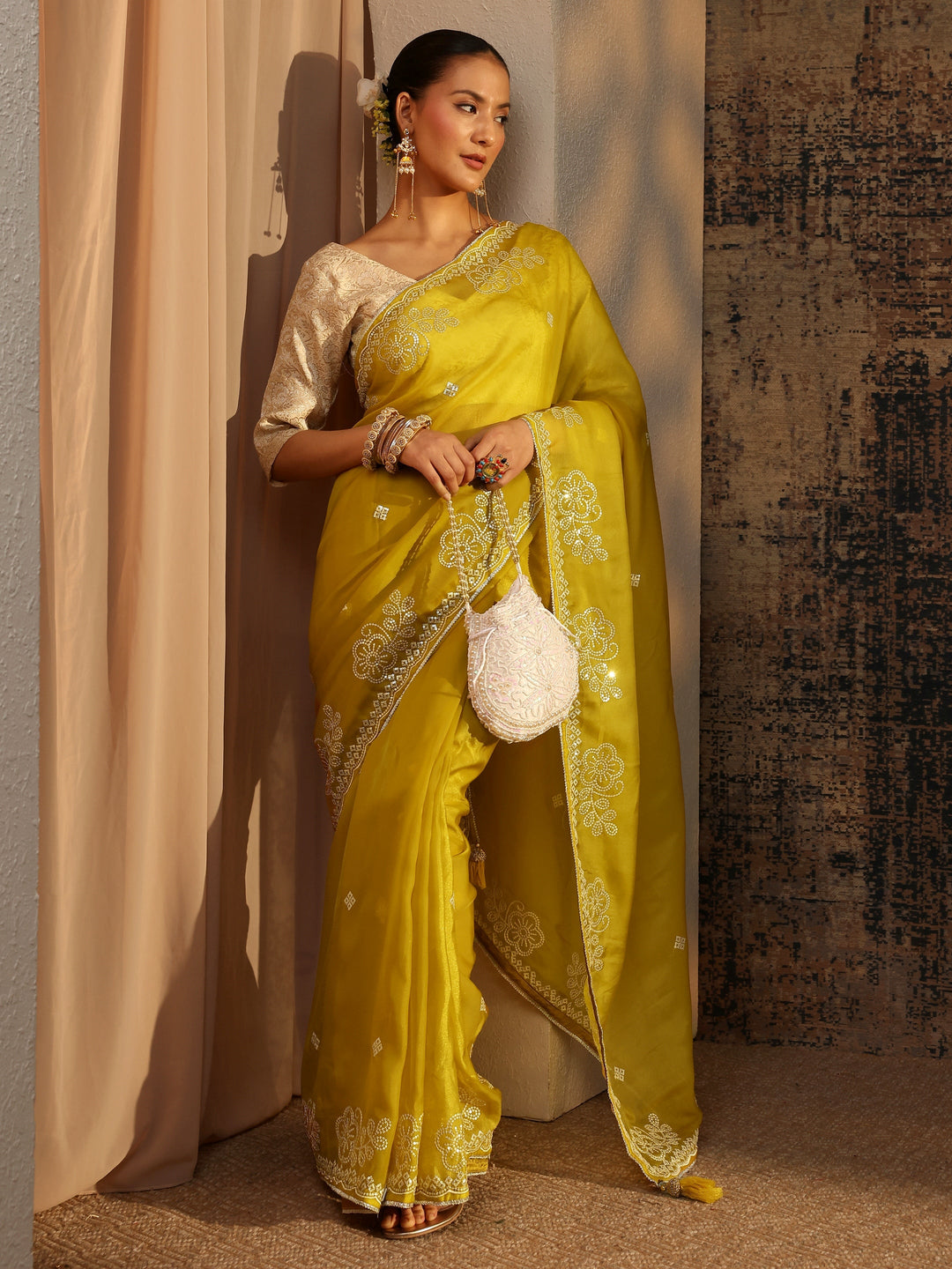 Mustard Ethnic Motifs Embellished Tissue Saree With Unstitched Blouse Piece