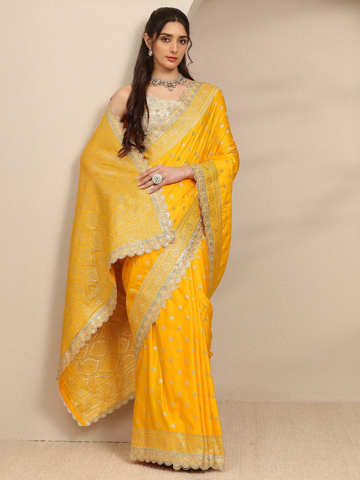 Mustard Ethnic Motifs Woven Design Silk Blend Saree With Unstitched Blouse Piece
