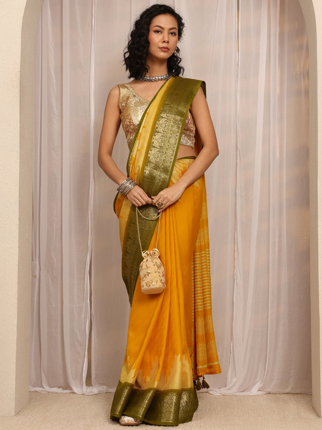 Mustard Woven Design Silk Blend Saree With Unstitched Blouse Piece