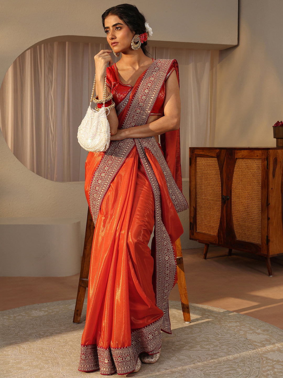 Orange Embellished Border Glossy Satin Saree