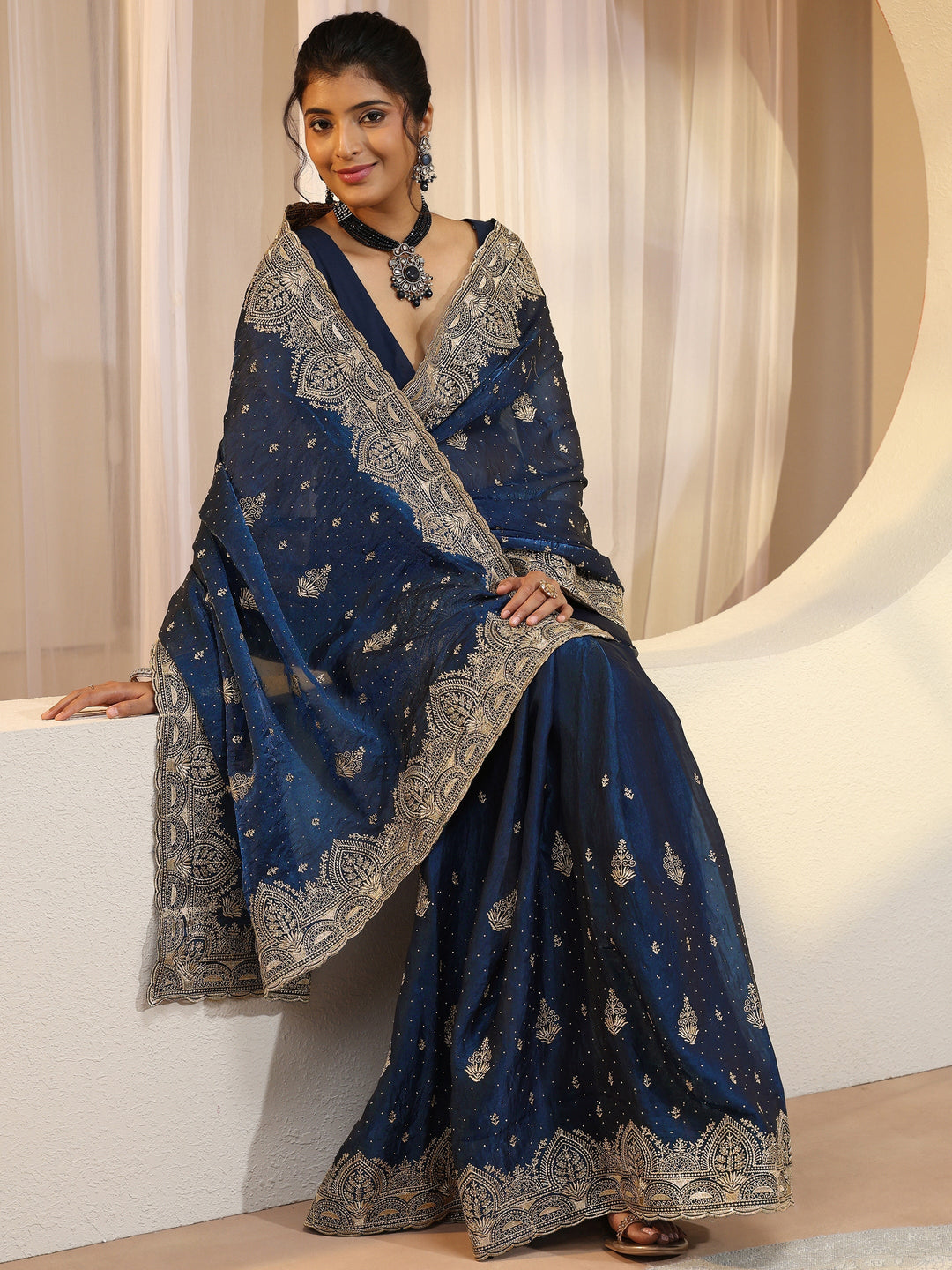 Peacock Blue Tissue Saree With Embellished Border