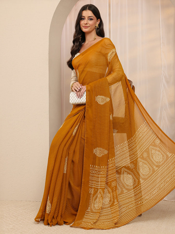 Pink Ethnic Motif Silk Blend Saree 
With Unstitched Blouse Piece