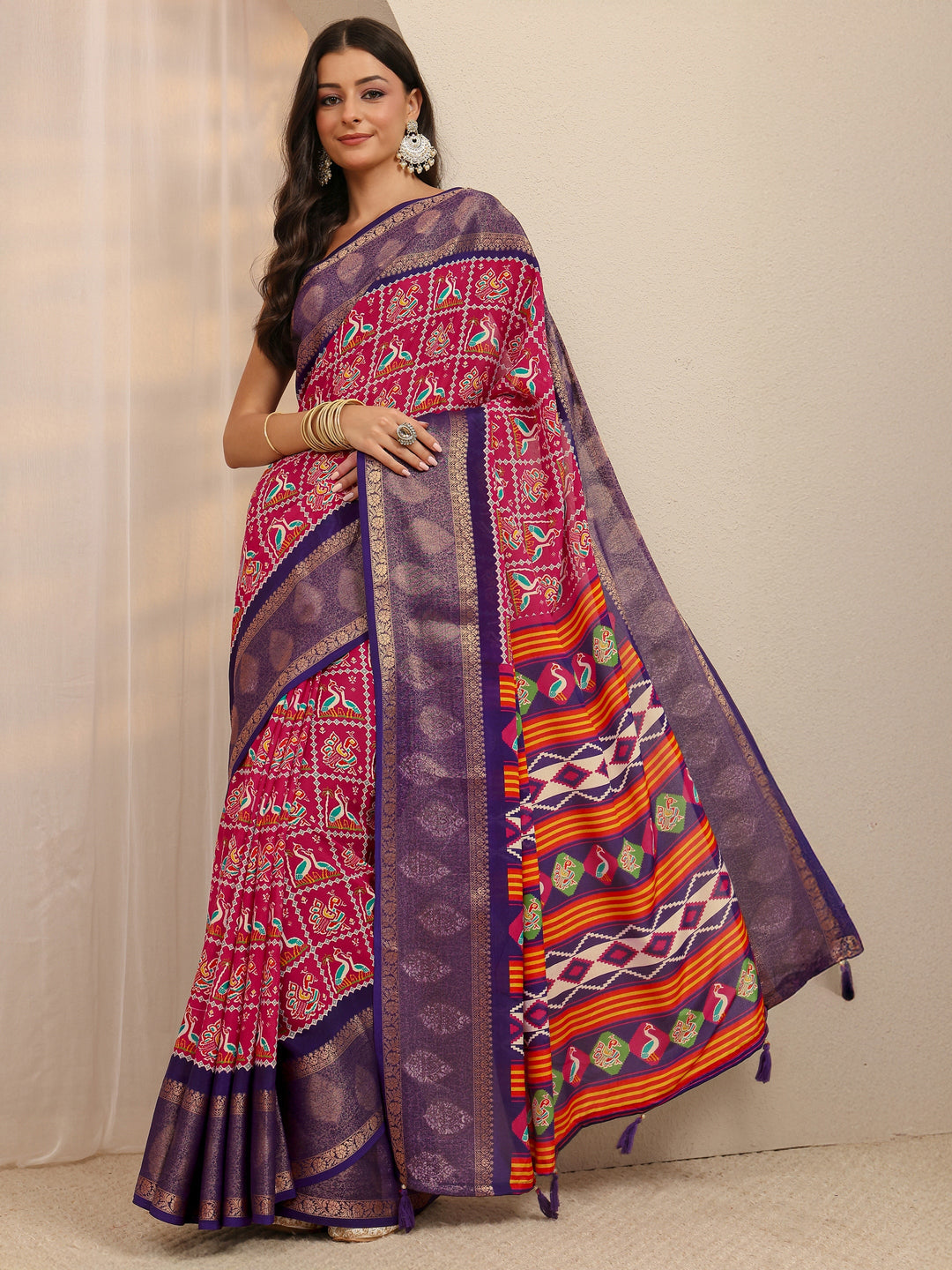 Pink Patola Silk Blend Saree 
With Unstitched Blouse Piece