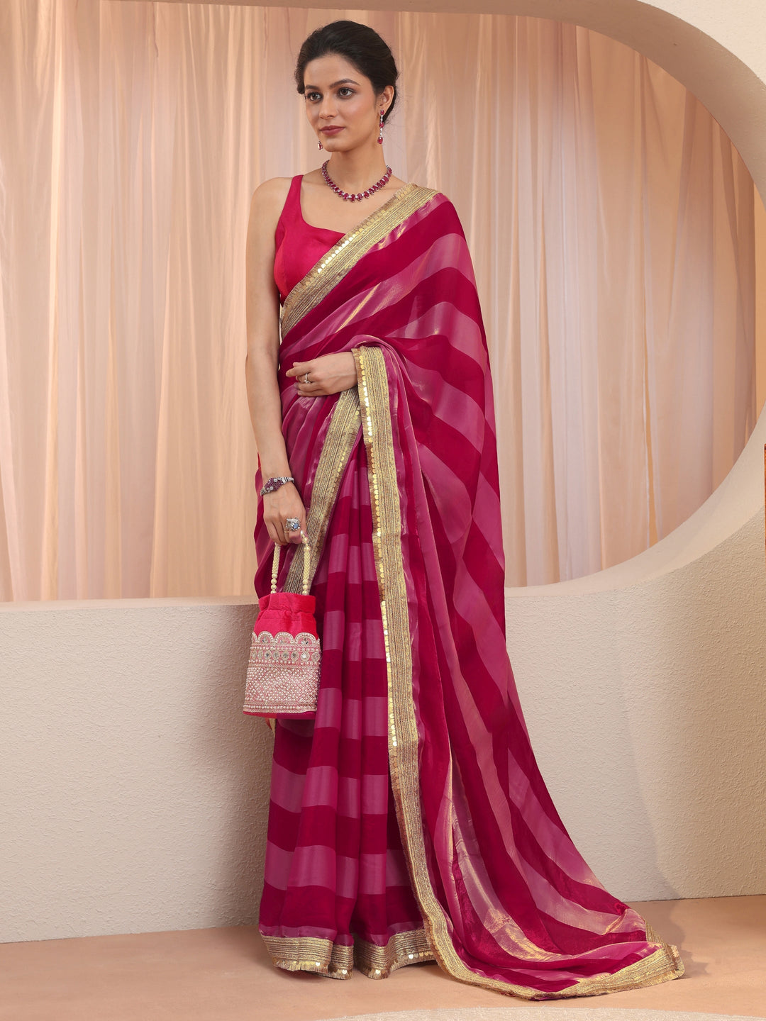 Pink Striped Textured Tissue Saree