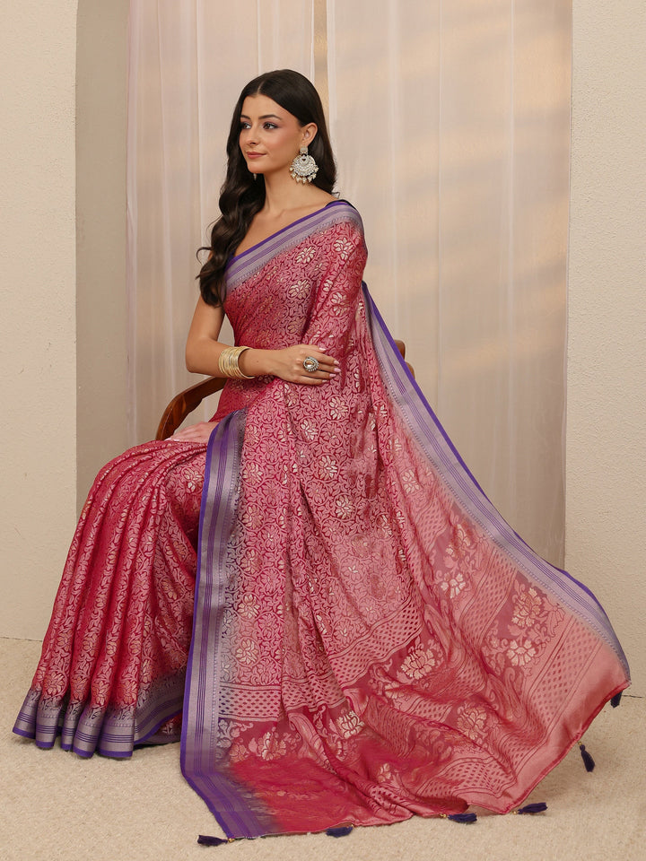 Pink Woven Design Silk Blend Saree 
With Unstitched Blouse Piece