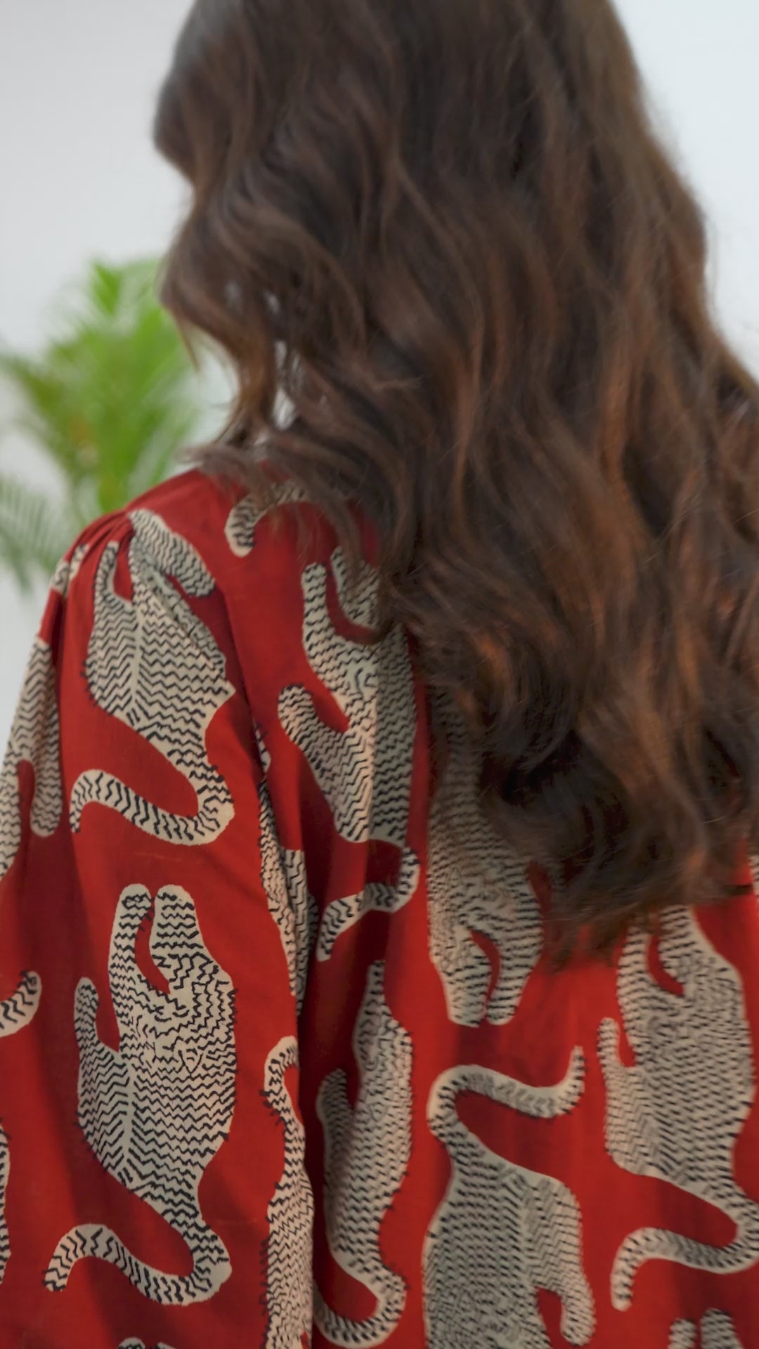 Rust Tribal Printed Cotton Blend Straight Short Kurti