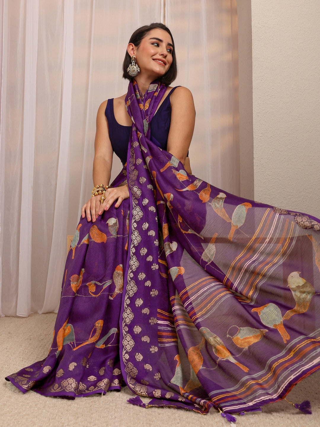 Purple Animal Printed Silk Blend Saree 
With Unstitched Blouse Piece
