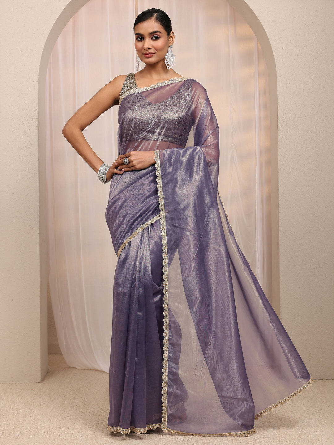 Purple Embellished Sheen Net Saree 
With Unstitched Blouse Piece