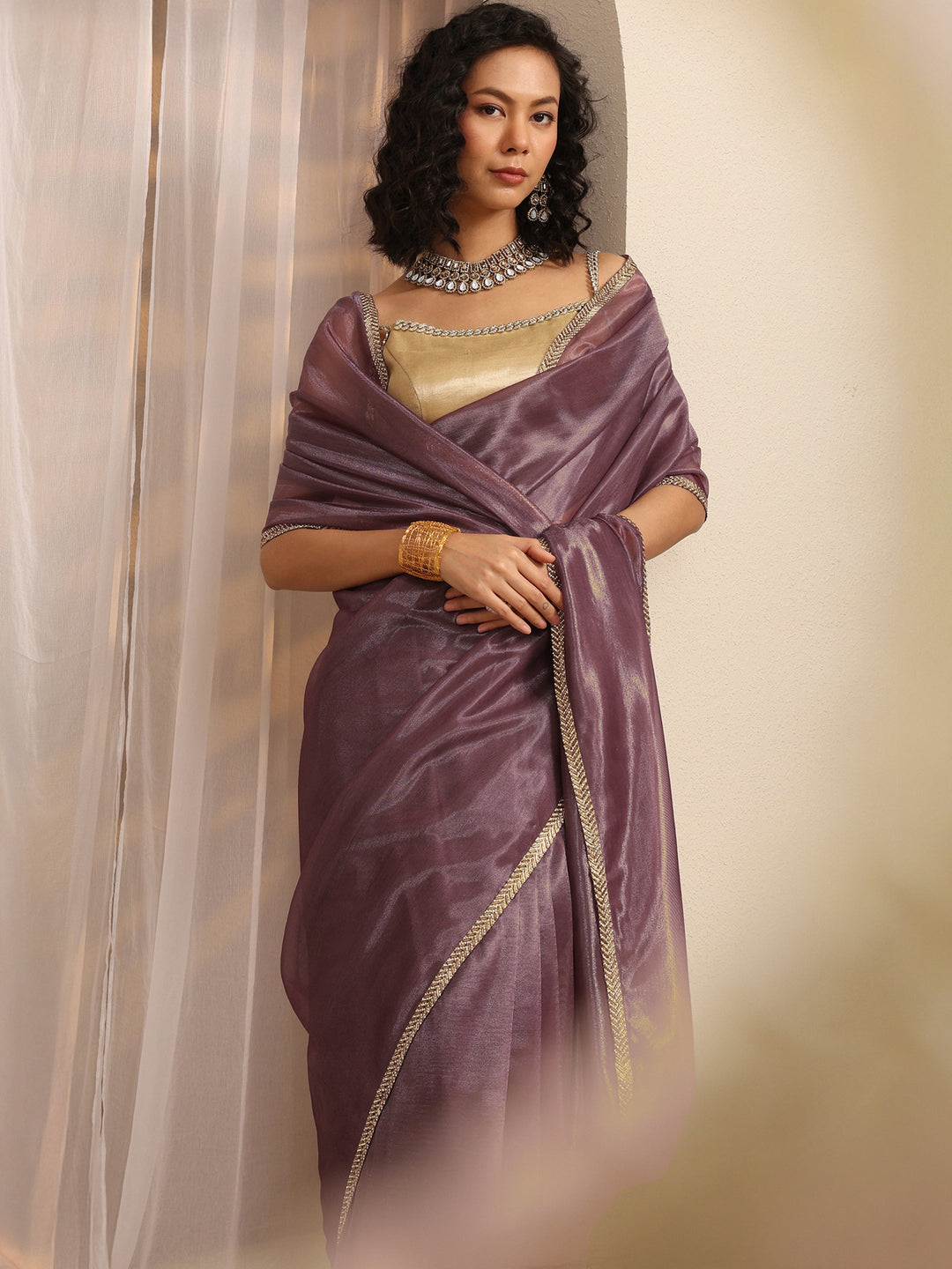 Purple Woven Design Net Saree With Unstitched Blouse Piece