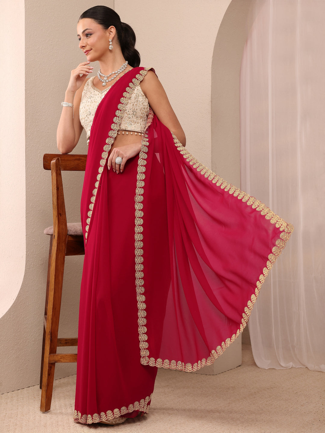 Red Embellished Silk Blend Saree 
With Unstitched Blouse Piece