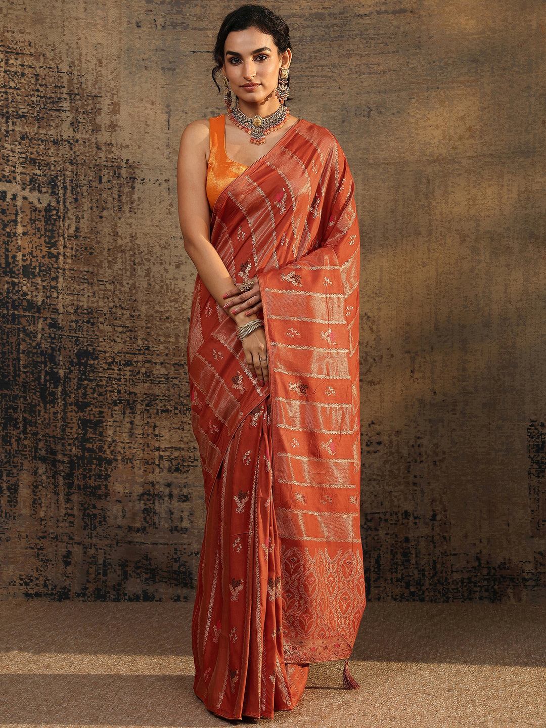 Rust Woven Design Silk Blend Saree With Unstitched Blouse Piece