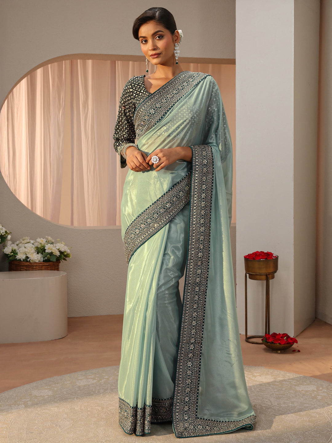 Sea Green Satin Saree With Floral Border