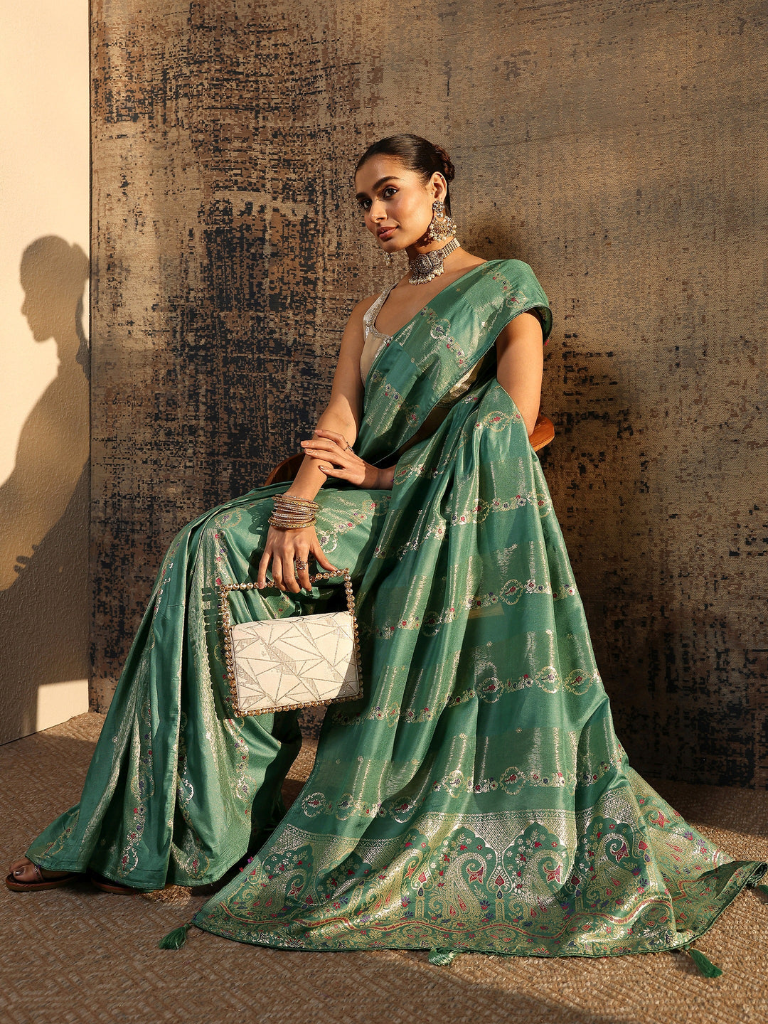 Sea Green Woven Design Silk Blend Saree With Unstitched Blouse Piece