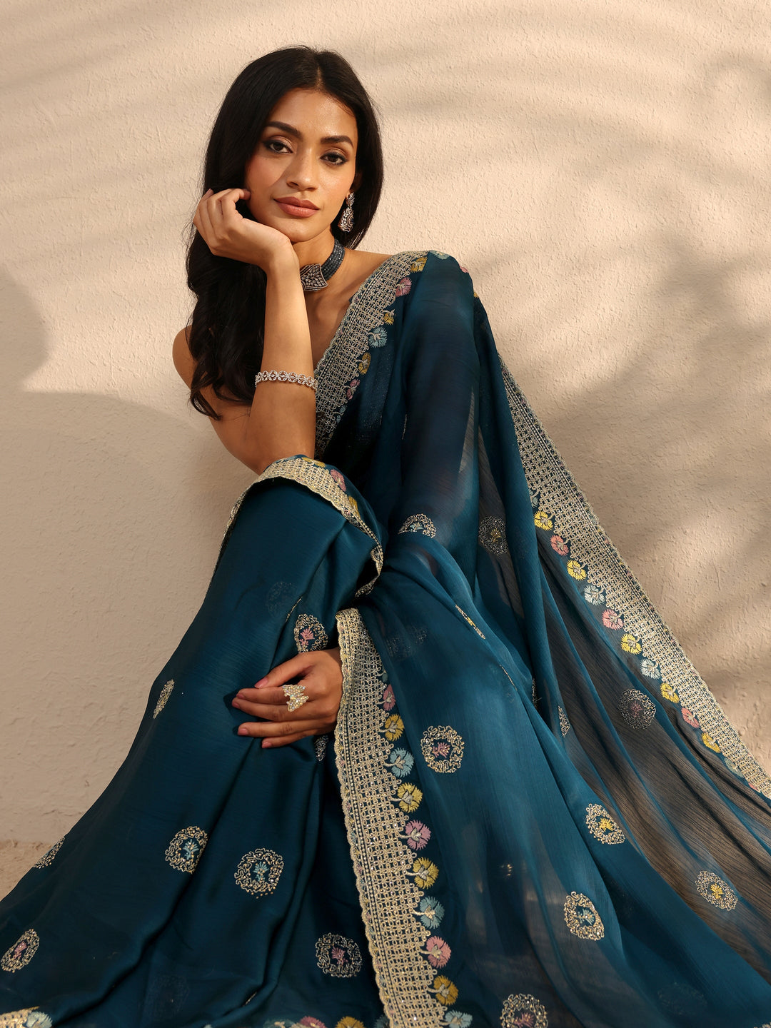 Teal Embellished Satin Sareewith Unstitched Blouse Piece
