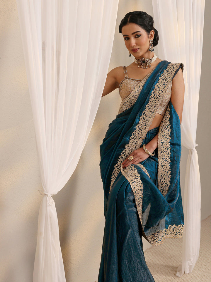 Teal Embellished Tissue Saree With Unstitched Blouse Piece