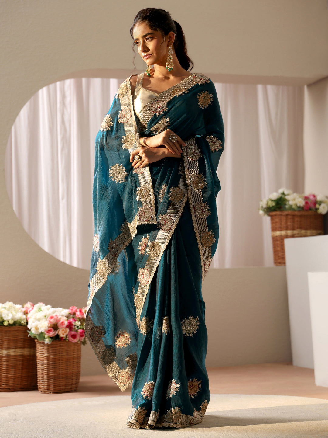 Teal Floral Embroidered Tissue Saree