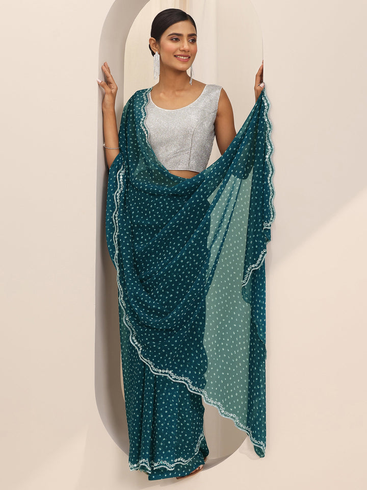 Teal Printed Georgette Saree With Unstitched Blouse Piece