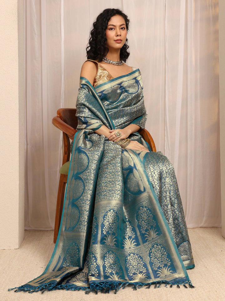 Teal Woven Design Silk Blend Saree With Unstitched Blouse Piece