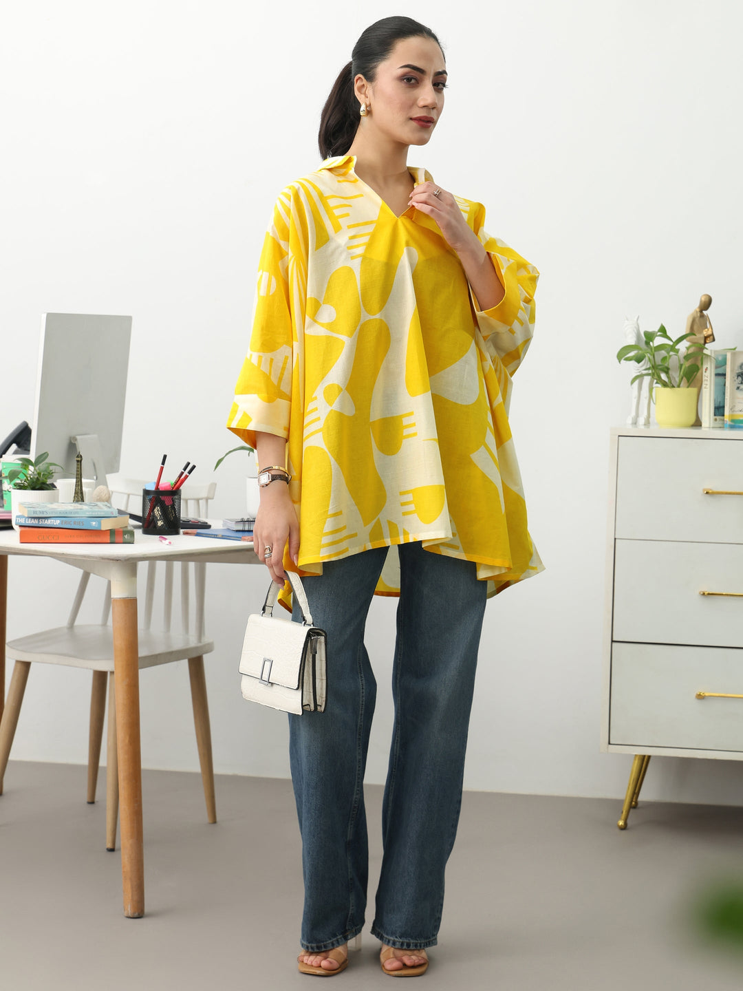 Yellow Abstract Printed Cotton Blend A-Line Short Kurti