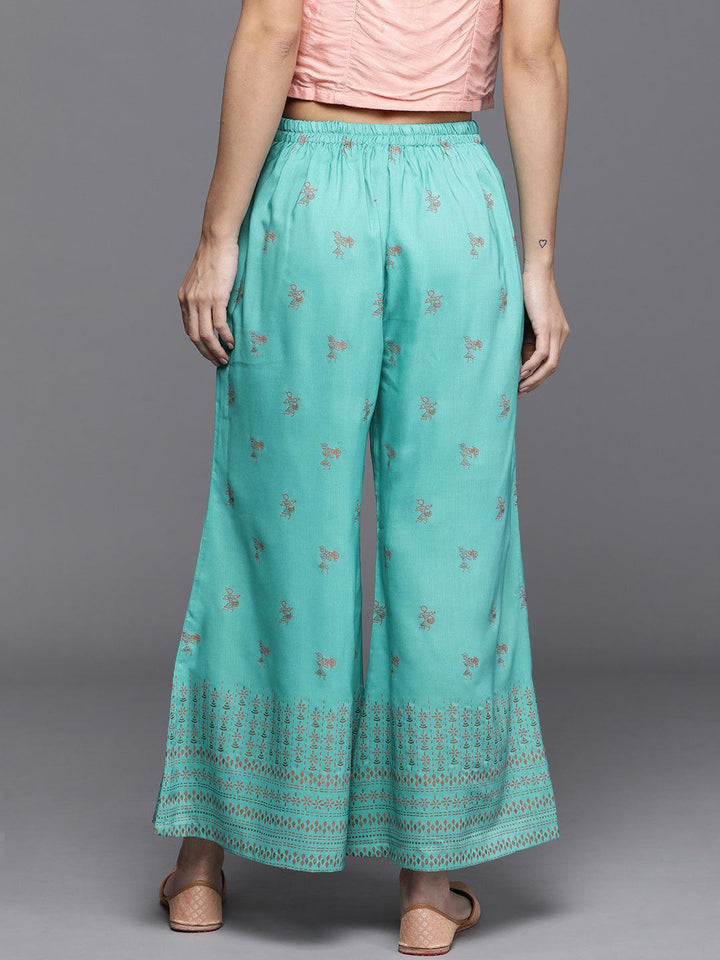 Turquoise Blue Printed Silk Palazzos - ShopLibas